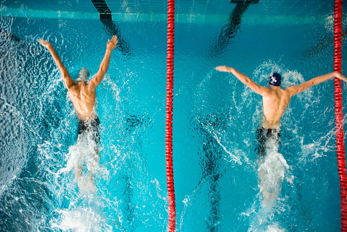 Sport Fotografie mit Schwimmer im Schmetterling Schwimmstil | Felix Krammer Fotografie